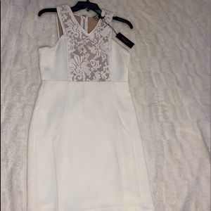 Cream colored cocktail dress.